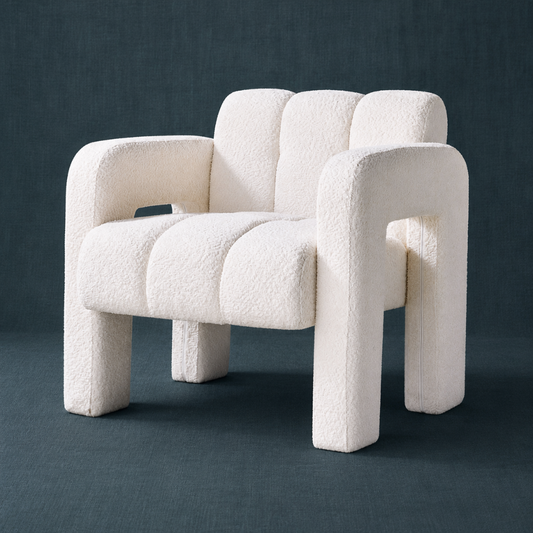 Beige sculpted bouclé upholstered accent chair with rounded arms and segmented cushioning against a dark teal textured studio backdrop. — for Carpe Diem Dream