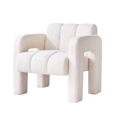 Beige sculpted bouclé upholstered accent chair with rounded arms, segmented cushioning, and a solid architectural frame. — for Carpe Diem Dream