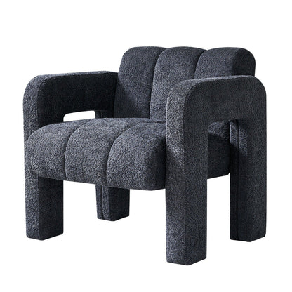 Dark gray sculpted bouclé upholstered accent chair with rounded arms, segmented cushioning, and a solid architectural frame. — for Carpe Diem Dream