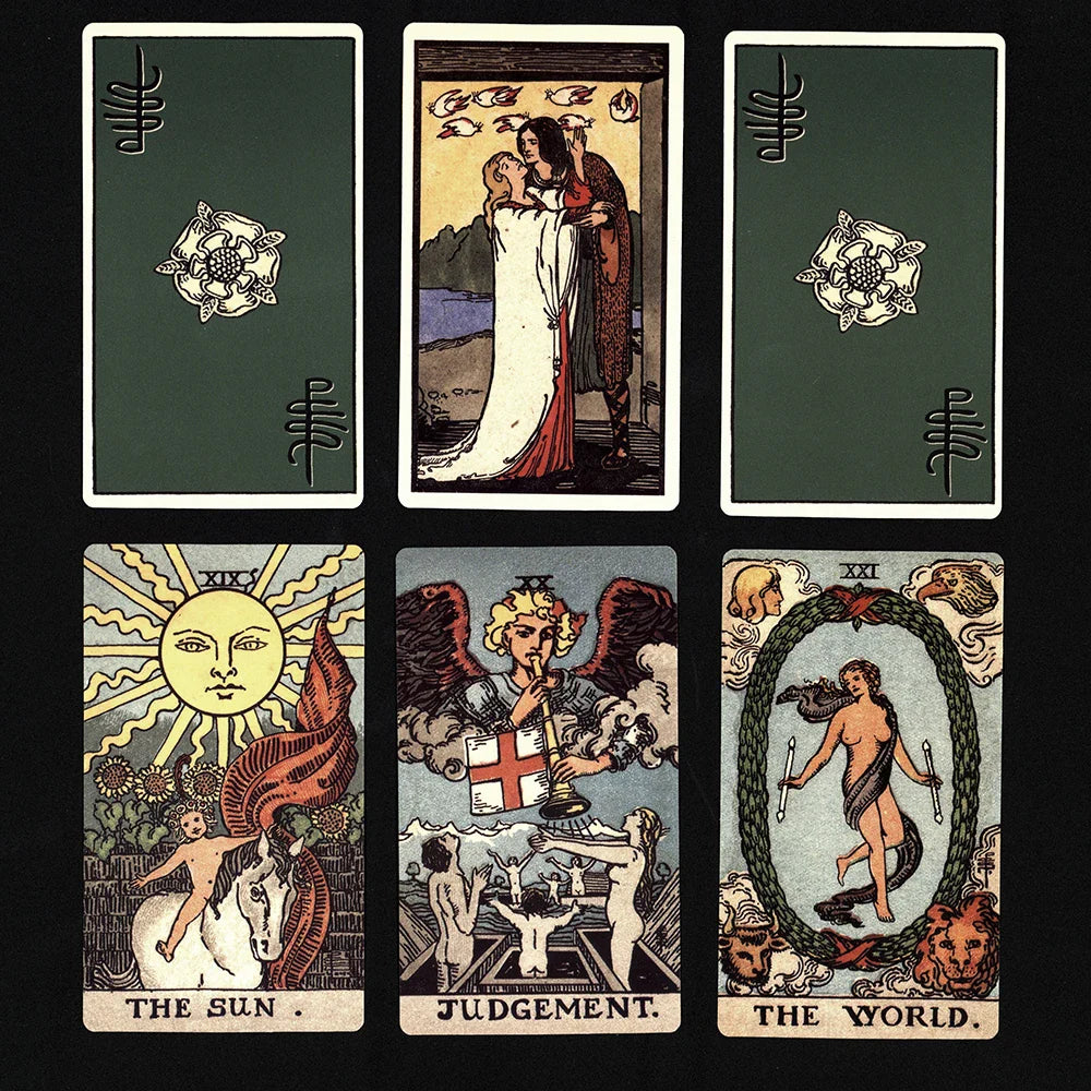 A selection of Smith-Waite Tarot cards including The Sun, Judgement, The World, and The Lovers displayed on a dark background showing authentic borderless artwork. — for Carpe Diem Dream