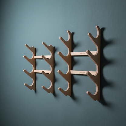 Two natural wood StackRack yoga prop wall organizers in different sizes mounted on a teal textured wall. — for Carpe Diem Dream