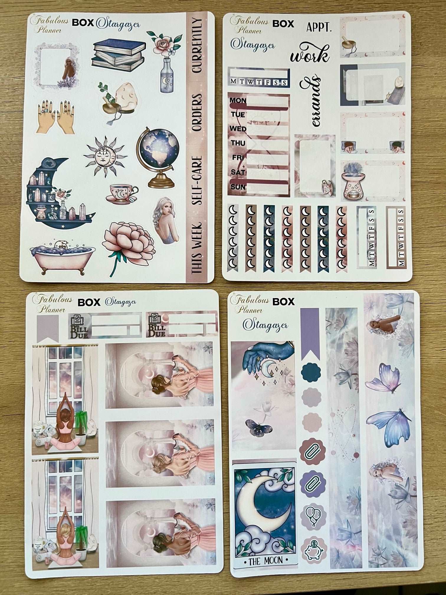 All four 4x6 stargazer planner sticker sheets featuring mystical illustrations, moon phases, crystals, and celestial designs arranged on a wooden background. — for Carpe Diem Dream