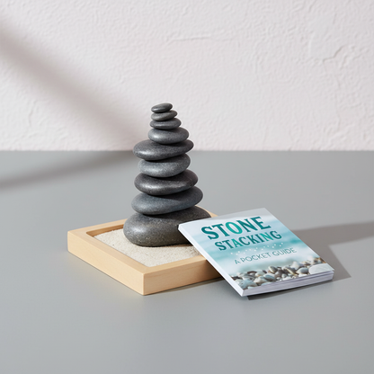 Stone Stacking mindfulness kit with balanced hematite stones, beechwood tray, sand, and pocket guide displayed in a clean studio setting. — for Carpe Diem Dream
