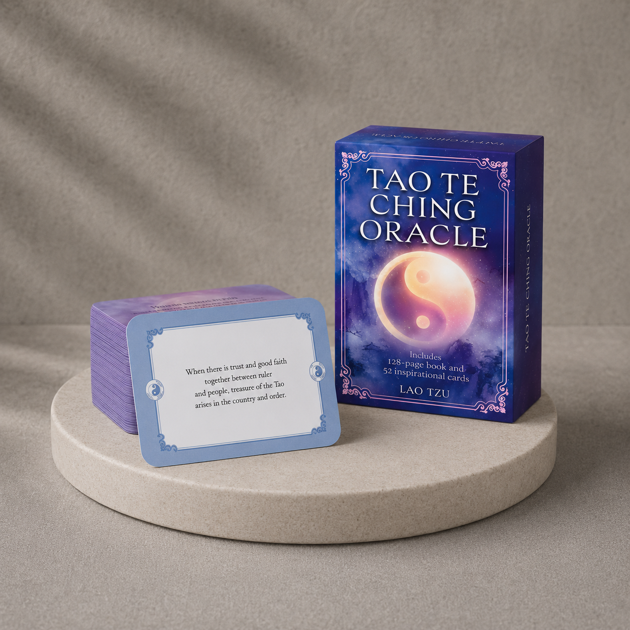 The Tao Te Ching Oracle Book & Cards professionally photographed on a honed stone riser with a contemplative wisdom card, showcasing the artwork, packaging, card design, and craftsmanship in the Carpe Diem Dream studio. — for Carpe Diem Dream