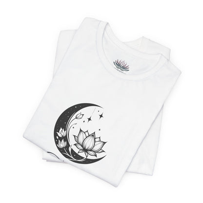 Taurus Moon I Cherish Stability zodiac T-shirt in white with black moon-inspired lotus, floral, and celestial artwork, shown folded in a supplier mockup. — for Carpe Diem Dream