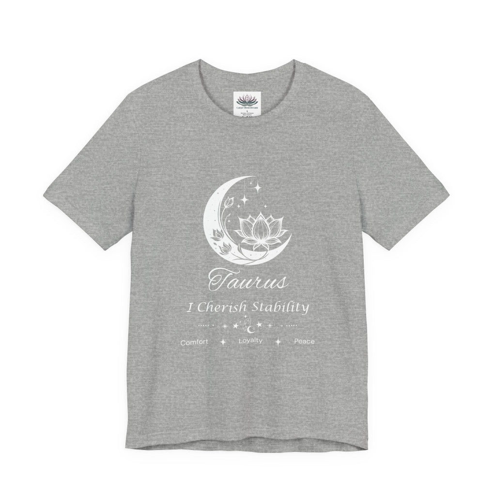 Athletic Heather Taurus Moon I Cherish Stability zodiac T-shirt with white moon-inspired lotus, floral, and celestial artwork, shown in a flat front supplier mockup. — for Carpe Diem Dream
