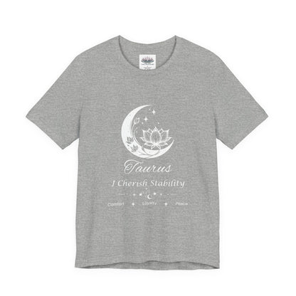 Athletic Heather Taurus Moon I Cherish Stability zodiac T-shirt with white moon-inspired lotus, floral, and celestial artwork, shown in a flat front supplier mockup. — for Carpe Diem Dream