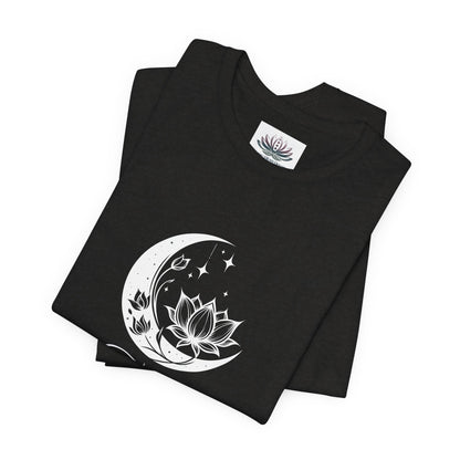 Taurus Moon I Cherish Stability zodiac T-shirt in Black Heather with white moon-inspired lotus, floral, and celestial artwork, shown folded in a supplier mockup. — for Carpe Diem Dream