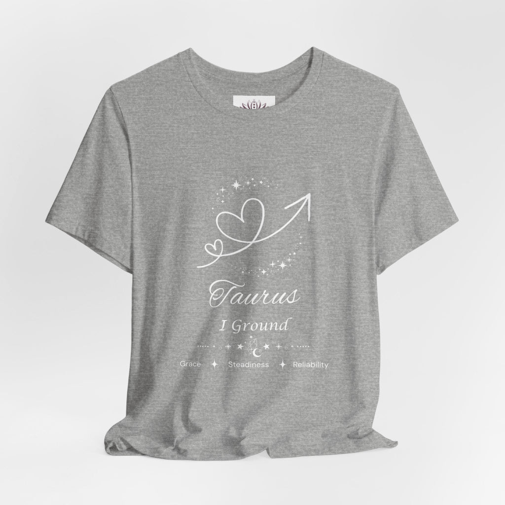 Taurus Rising I Ground zodiac T-shirt in Athletic Heather with white celestial heart and arrow artwork and Grace, Steadiness, Reliability text, shown in a front supplier mockup. — for Carpe Diem Dream