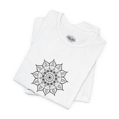 Taurus Sun I Have zodiac T-shirt in white with black sun-inspired mandala artwork, shown folded with Carpe Diem Dream neck label in a supplier mockup. — for Carpe Diem Dream