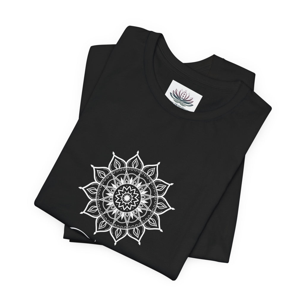 Taurus Sun I Have zodiac T-shirt in black with white sun-inspired mandala artwork, shown folded with Carpe Diem Dream neck label in a supplier mockup. — for Carpe Diem Dream