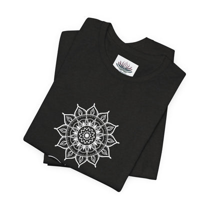 Taurus Sun I Have zodiac T-shirt in black heather with white sun-inspired mandala artwork, shown folded with Carpe Diem Dream neck label in a supplier mockup. — for Carpe Diem Dream
