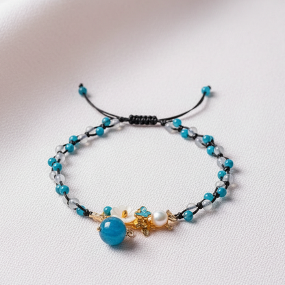 Crystal anklet with pearl, moonstone, and apatite displayed as the main product image on a softly lit neutral background. — for Carpe Diem Dream