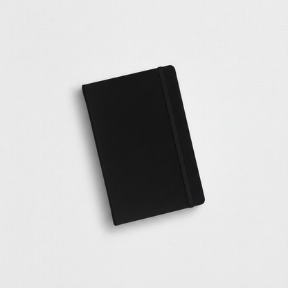 A black velvet hard cover journal with an elastic band closure displayed at a slight angle on a clean neutral background. — for Carpe Diem Dream