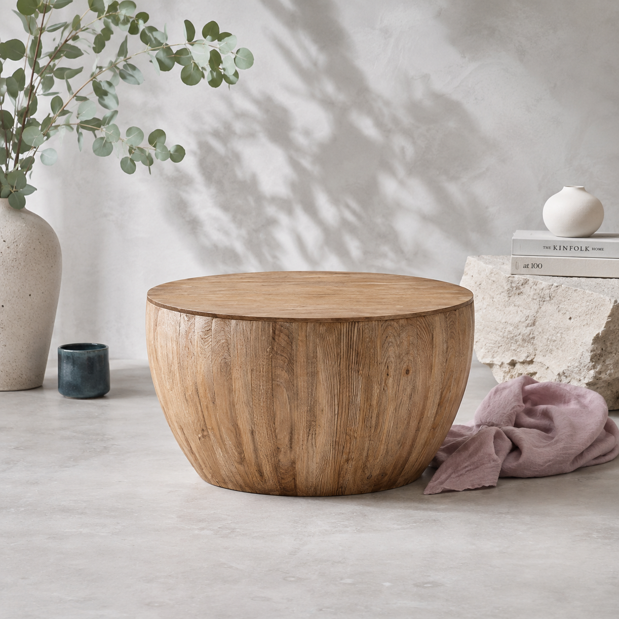 Vintage barrel storage coffee table styled in a cool-toned botanical studio with natural fir wood grain, eucalyptus, mauve linen, stone accents, and soft botanical shadows. — for Carpe Diem Dream