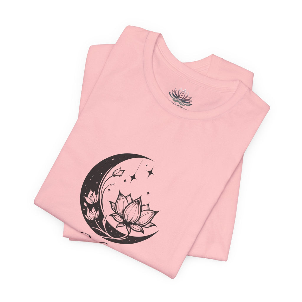Virgo Moon I Cherish Order zodiac T-shirt in pink with black moon-inspired lotus, floral, and celestial artwork, shown folded in a supplier mockup. — for Carpe Diem Dream