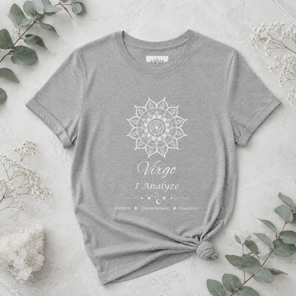 Virgo Sun I Analyze zodiac T-shirt in athletic heather with white sun-inspired mandala artwork and Service, Discernment, Precision text, styled in a cool-toned studio botanical flat lay. — for Carpe Diem Dream