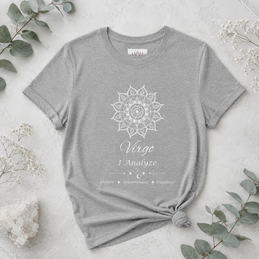 Virgo Sun I Analyze zodiac T-shirt in athletic heather with white sun-inspired mandala artwork and Service, Discernment, Precision text, styled in a cool-toned studio botanical flat lay. — for Carpe Diem Dream