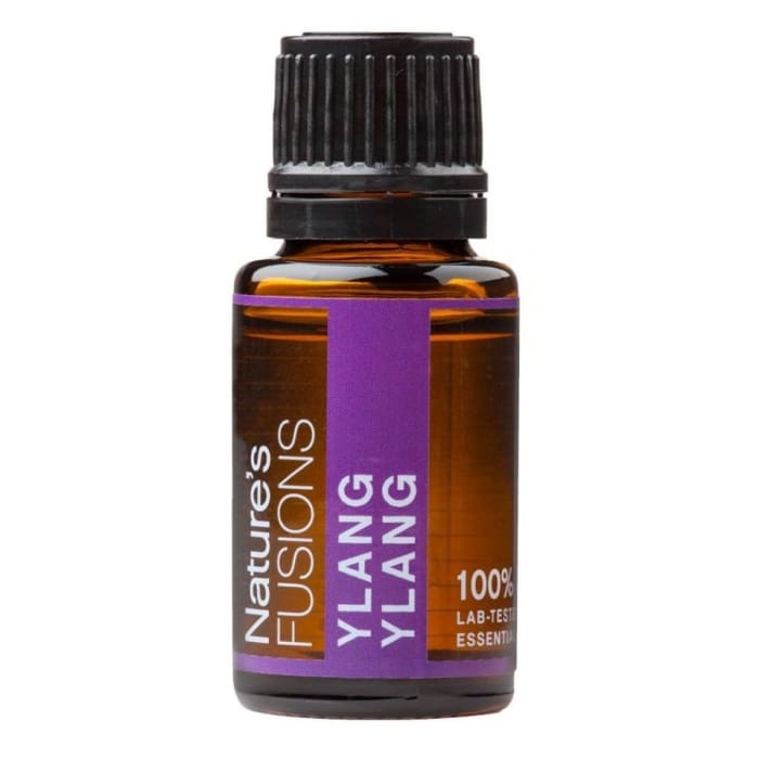 A 15ml amber glass bottle of Ylang Ylang essential oil with a black cap and purple label displayed on a white background. — for Carpe Diem Dream