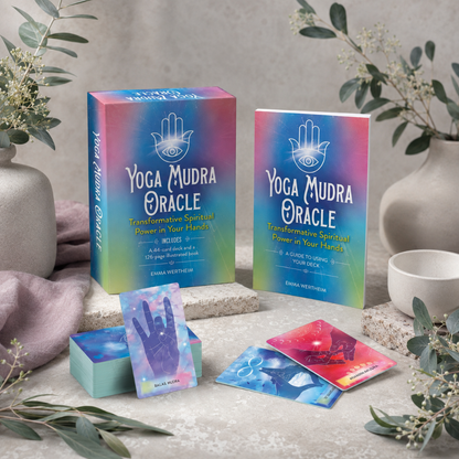 Yoga Mudra Oracle book and card deck styled in a botanical studio with sample mudra cards, eucalyptus, mauve linen, cool stone surfaces, and soft neutral ceramics. — for Carpe Diem Dream