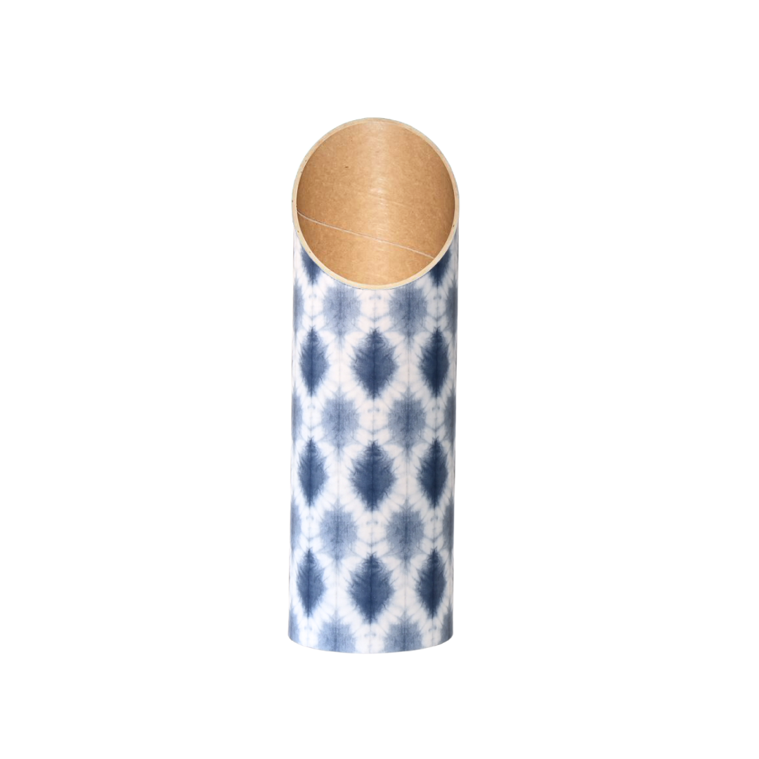 Navy and white patterned yoga storage tube shown alone on a white background. — for Carpe Diem Dream