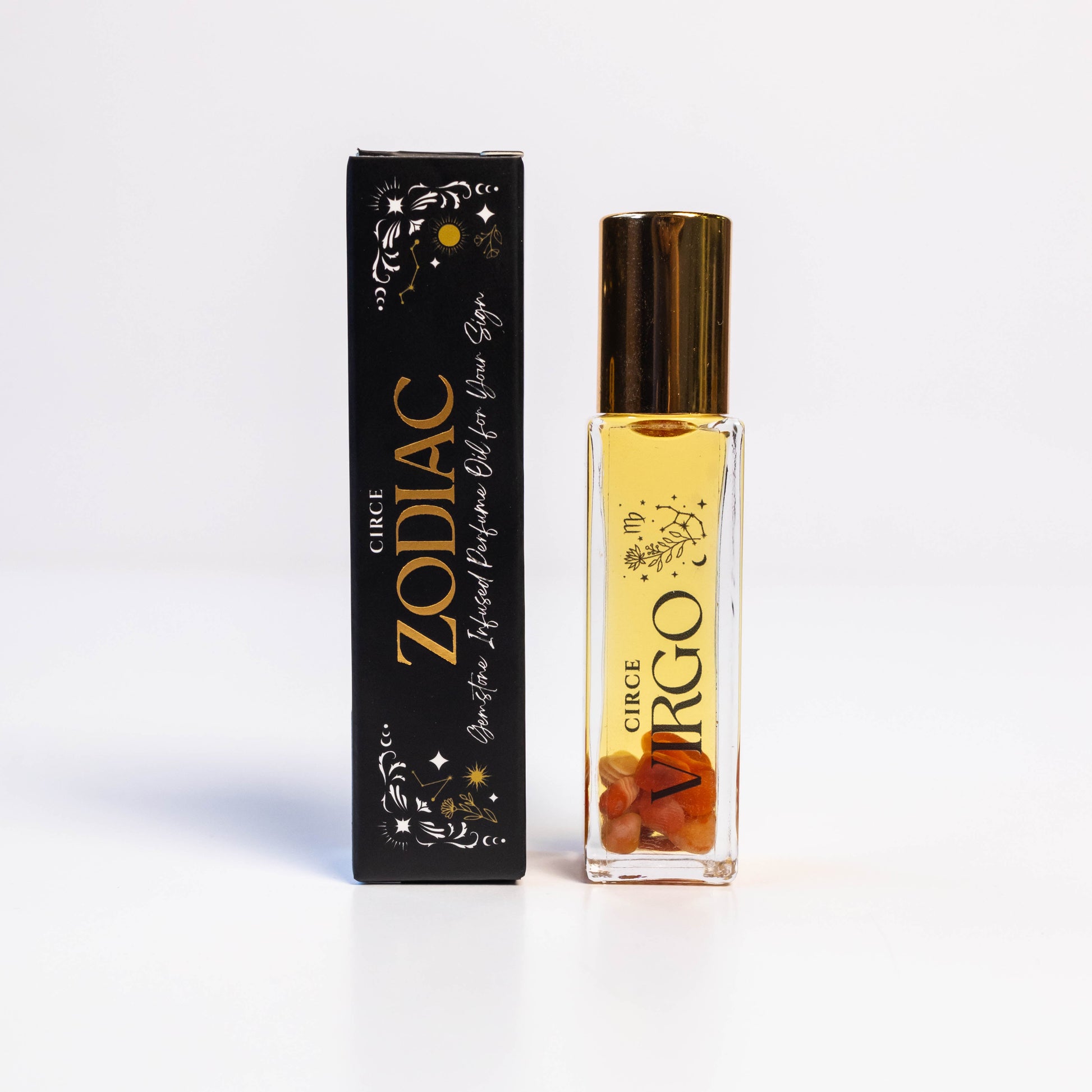 Virgo zodiac gemstone perfume oil rollerball with carnelian crystals displayed beside zodiac packaging on a white background. — for Carpe Diem Dream